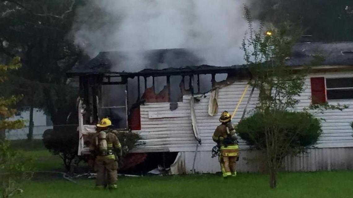 Burton Fire District firefighters put out a house fire on Joe Frazier Road the morning of Sept. 28, 2016.