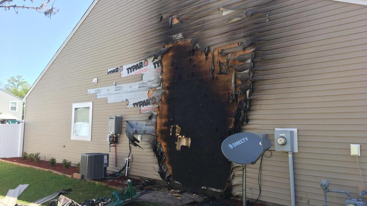 A Shadow Moss home caught fire after flames spread from a garbage can beside the house.