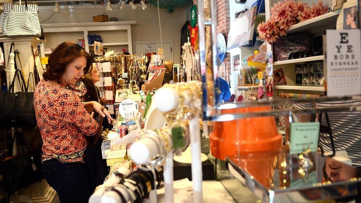 Beth Hearn, of Anderson, S.C., browses the checkout counter at Lulu Burgess on Bay Street in downtown Beaufort. Southern Living magazine recently named Beaufort as a “Walkable Girlfriend Getaway.”