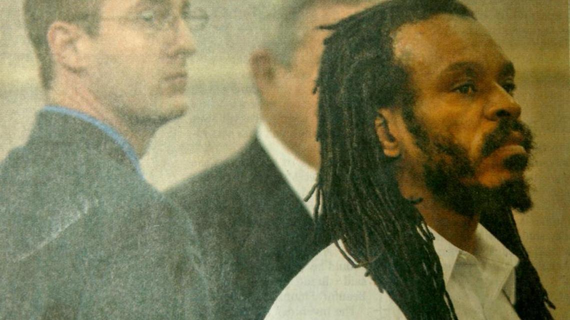 Tyree Roberts, right, shows little emotion Oct. 20, 2003, as a jury convicts him of killing two Beaufort County Sheriff's deputies on Jan. 8, 2002, as his court-appointed attorneys stand in the background.