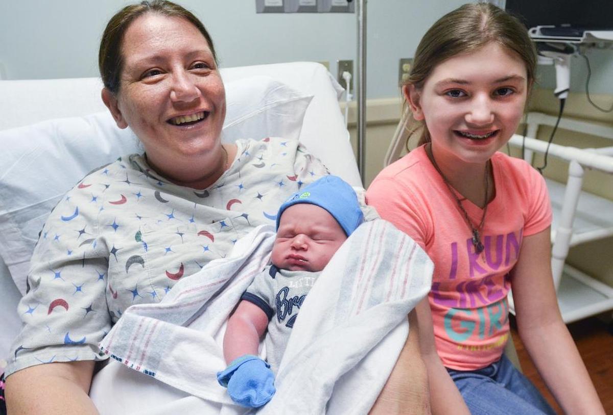 Leayn Barber and daughter, Layn Barber, 10, of Port Royal, are photographed on Jan. 1, 2017, with the latest addition to the family, John Lance Barber-Kaczowka, who was the first child to be born in 2017 at Beaufort Memorial Hospital. The baby boy was born at 7:32 a.m.