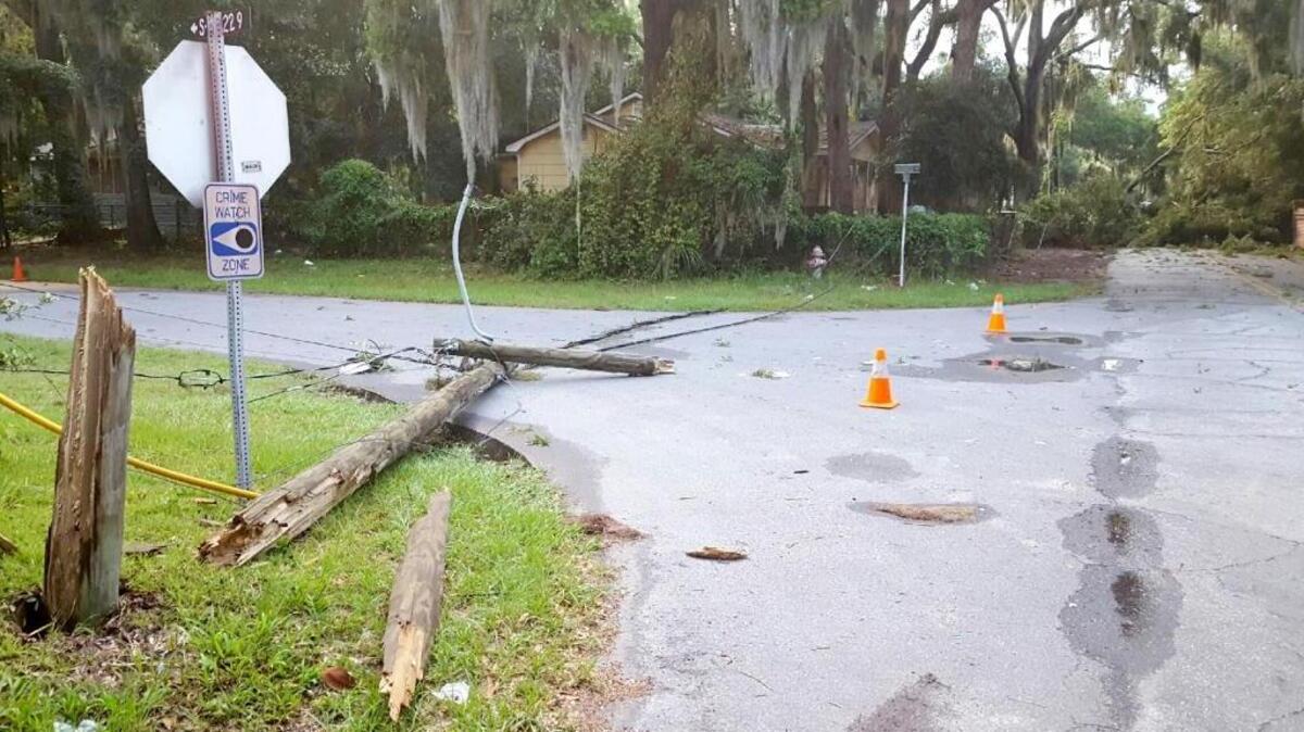 A powerful July 6, 2016, thunderstorm knocked over and splintered this power pole at Lafayette and Morris streets in Beaufort.