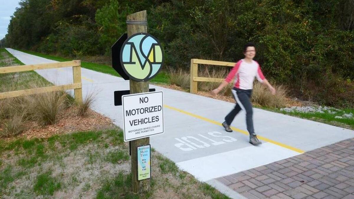 Taking a walk along the Spanish Moss Trail.