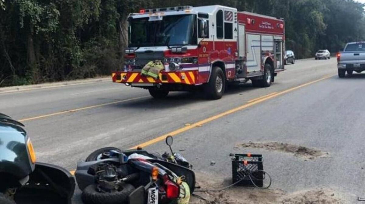 A pickup truck and a moped collided between Goethe Hill Road and Mink Point Boulevard shortly after 2:30 p.m. Thursday in Burton.