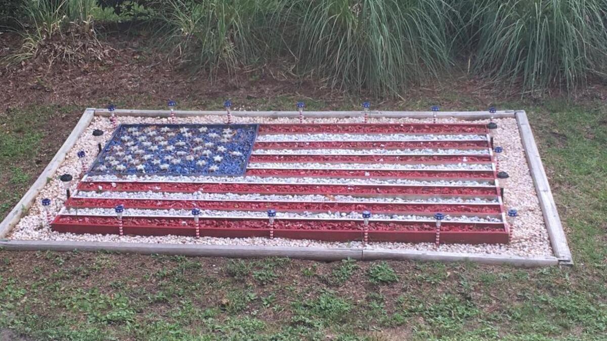 Rob Byrne’s wood, rock and Styrofoam flag.