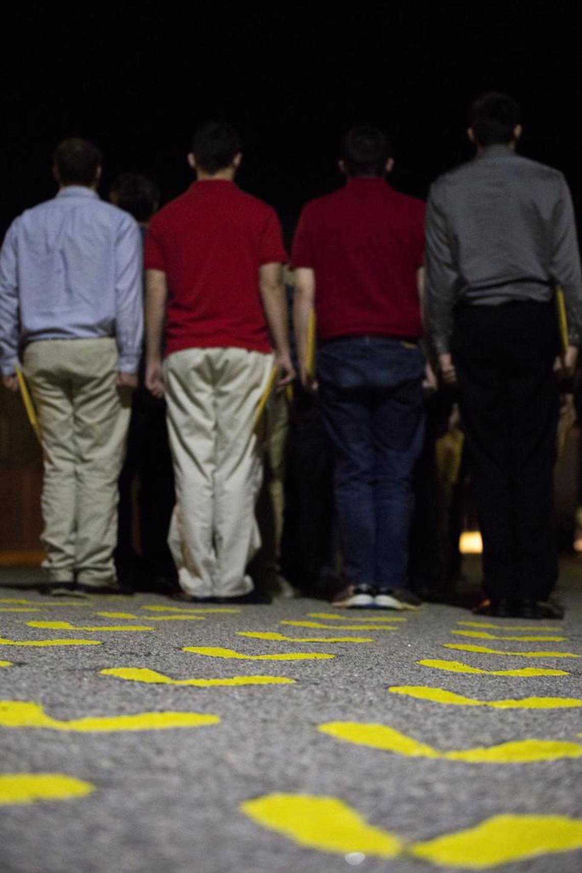 Young men stand on the famous yellow footprints Feb. 1, 2016, on Parris Island, S.C.