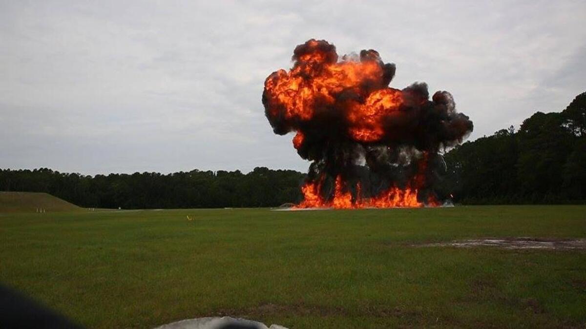 A wall of fire created by Marine explosive ordinance disposal technicians preparing for future MCAS Beaufort Air Shows.