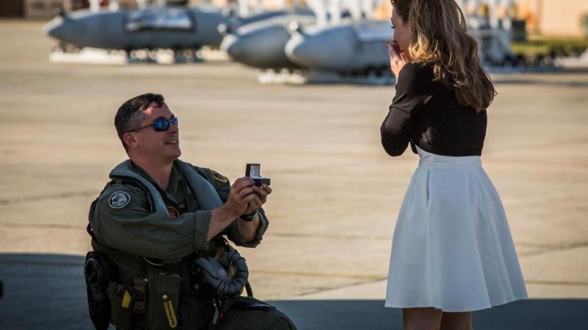 Maj. James Corrington proposes to his girlfriend on the flightline aboard Marine Corps Air Station Beaufort March 15. Corrington has been deployed to the Western Pacific with Marine All-Weather Fighter Attack Squadron 224 since October 2015. Corrington is a pilot.