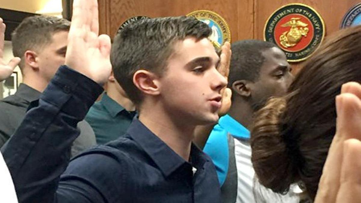 Morgan Brown, center, a recruit at Marine Corps Recruit Depot Parris Island and a resident of Mechanicsville, Va., takes the Oath of Enlistment on Jan. 19, 2016, at Fort Lee, Virginia.