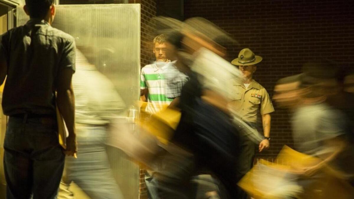 New recruits rush through the famous “Silver Hatches” at Marine Corps Recruit Depot Parris Island to begin boot camp in this September 2015 file photo.