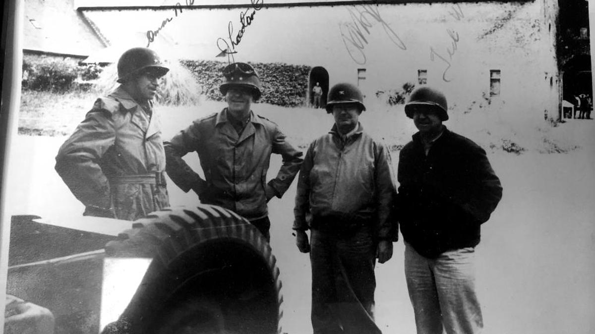 Bill Jeschke took a picture of this photograph featuring his grandfather, Richard “Hall” Jeschke, second from right, during World War II. Richard Jeschke was, in June 1944, a Marine Corps colonel who helped plan the amphibious assaults for the D-Day landings in Normandy.