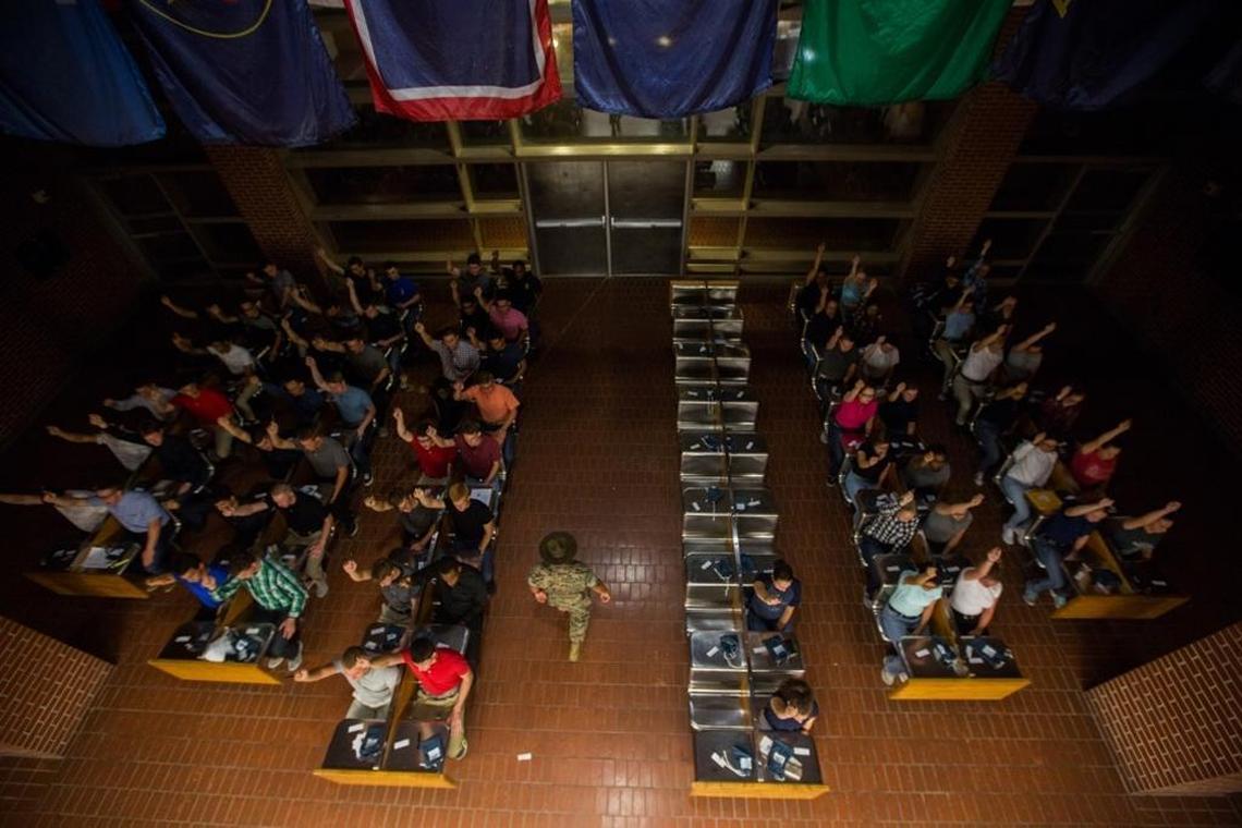 FILE: A U.S. Marine Corps drill instructor gives orders to new recruits June 5, 2017, on Parris Island, S.C.