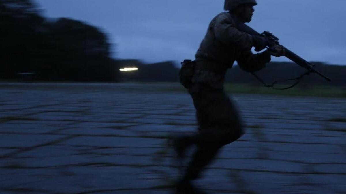 A U.S. Marine Corps Recruit with Fox Company, 2nd Battalion, Recruit Training Regiment, patrols during a portion of the Crucible known as the battle of Hue City at Page field on Aug. 29, 2017, at Marine Corps Recruit Depot Parris Island, S.C. The Crucible is the culminating event of recruit training that is designed to challenge recruits physically and mentally through combat related tasks.