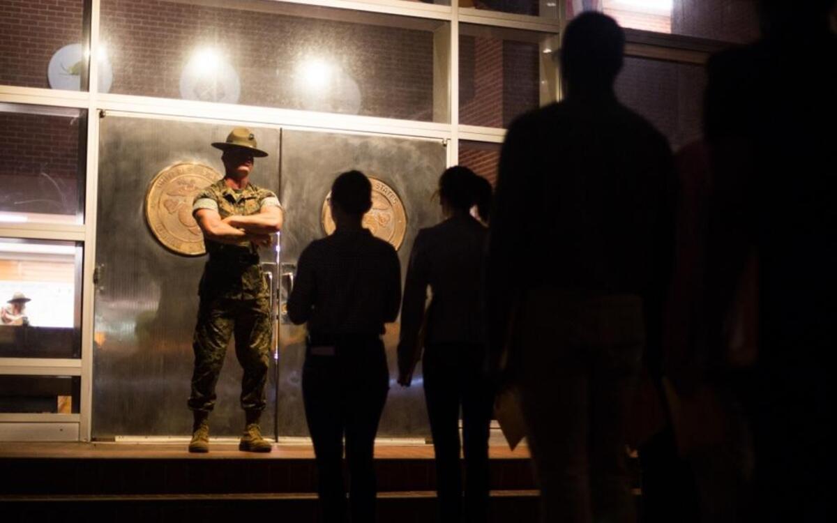 A Marine Corps drill instructor orders recruits to walk through the iconic silver doors June 5, 2017, at Marine Corps Recruit Depot Parris Island, S.C.