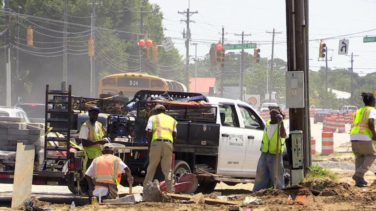 Construction crews work the Boundary Street project near Robert Smalls Parkway on June 23, 2016.