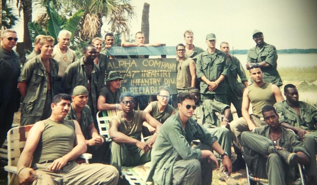 The “Forrest Gump” cast and crew shoots on location near Beaufort. Dale Dye, military adviser to the blockbuster film, standing fourth from left, suggested Hunting Island as a good place to film Vietnam scenes.