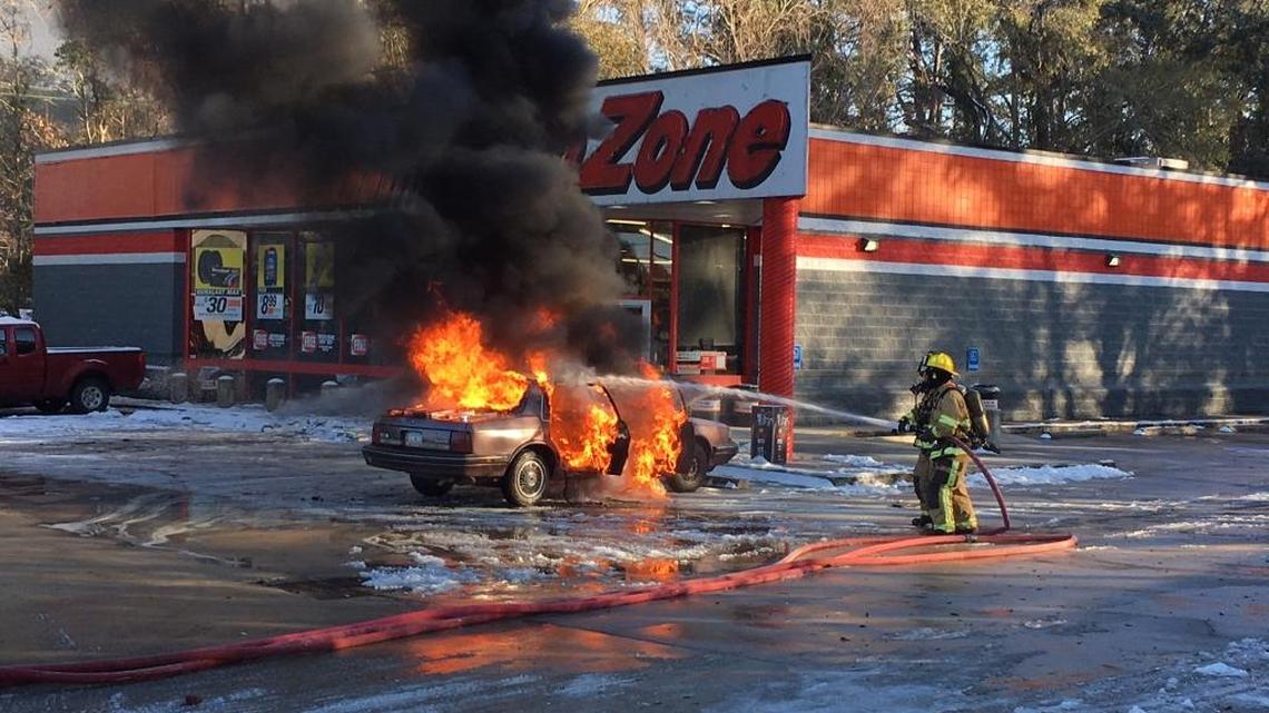 A car burns in the parking lot of AutoZone in Beaufort on Thursday, Jan. 4. Firefighters from Burton and Beaufort extinguished the blaze on Boundary Street, and no one was hurt.