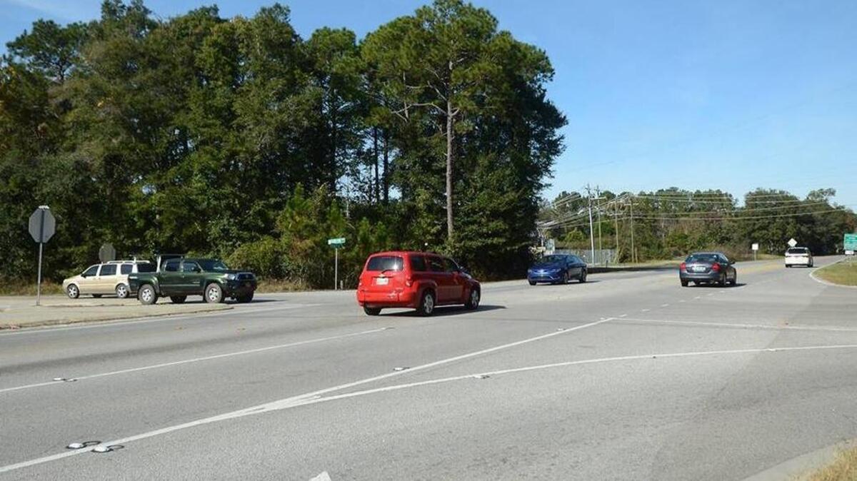 Traffic moves through the intersection of Sams Point, Holly Hall and Brickyard Point roads on Lady's Island on Nov. 30, 2015. Construction on a roundabout at the interchange is underway and is expected to be complete by next June.