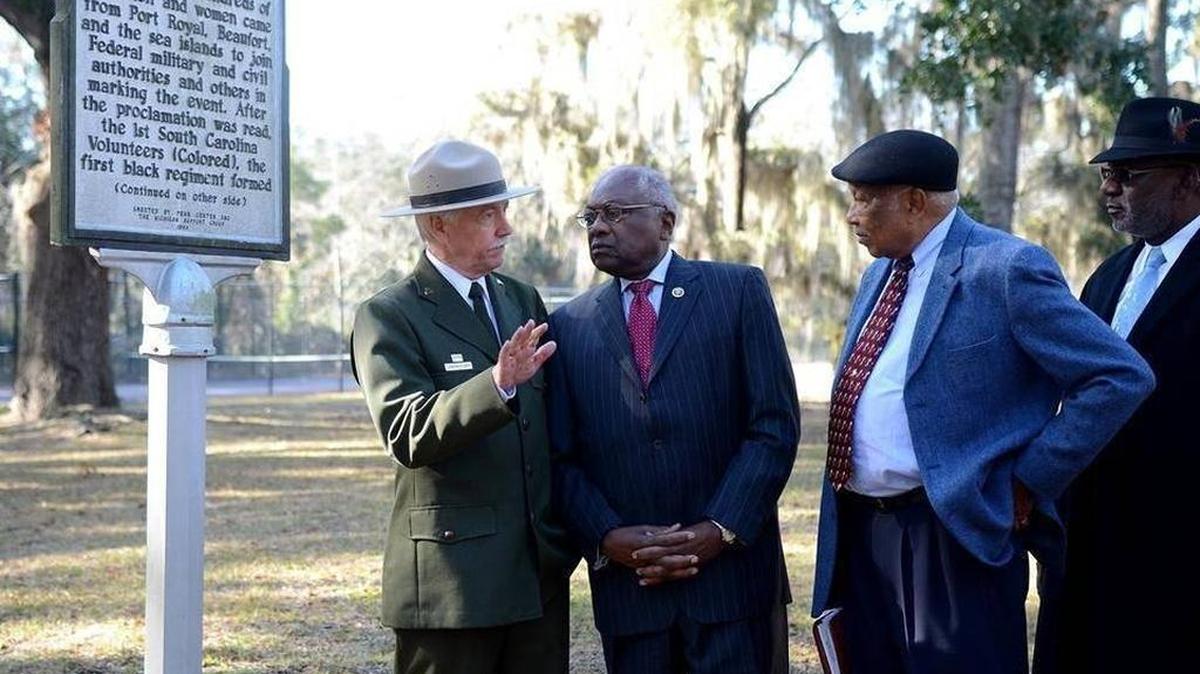 National Park Service director Jonathan Jarvis, from left, talks with Congressman Jim Clyburn and Port Royal Mayor Sam Murray on the site of the Emancipation Day celebration on Dec. 15, 2016, on the United States Naval Hospital Beaufort campus in Port Royal.