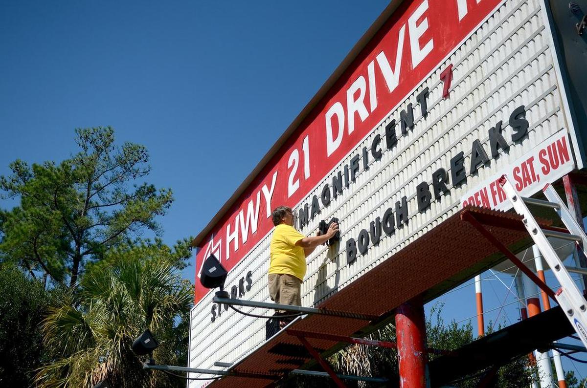 Joe Barth changes the movies listed in 2016, at the Highway 21 Drive-In in Beaufort. Jake Higgins has purchased the drive-in from Joe and Bonnie Barth.