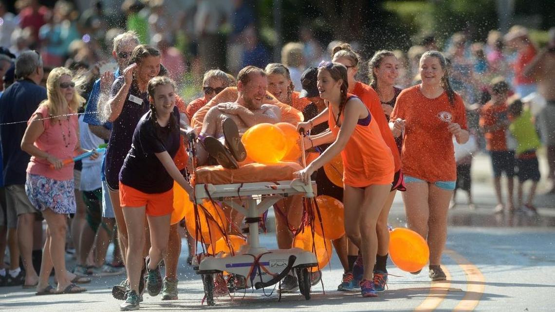 Splash of color: Water Festival bed race packs a surprise