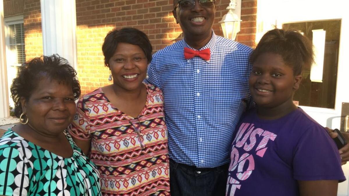 Darryl Owens stands with supporter Carolyn Hamilton, from left, wife Brenda Owens and daughter Eryka Owens at Port Royal Town Hall after learning he won a special election for Town Council on Tuesday, May 16.