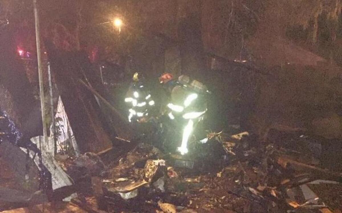 An illegal fire in Burton destroyed a shed and came within 10 feet of a home on Glaze Drive around 7 p.m. on Sunday..