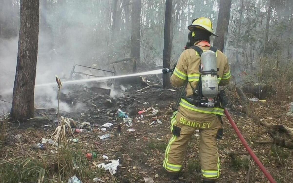 Burton Fire District firefighters extinguished a yard debris and trash fire on Monday afternoon - the second such fire in three days.