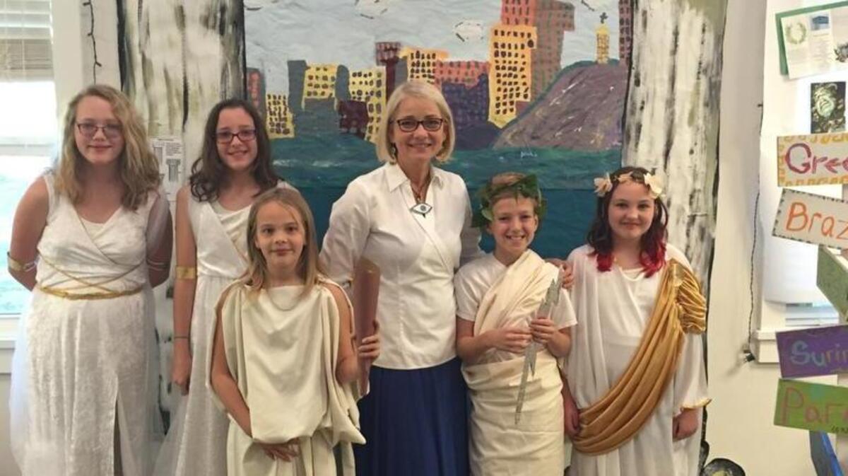 Students present a Greek display at Lowcountry Montessori School's second annual International night on Friday, Feb. 26, 2016.