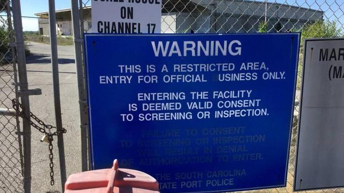 A sign on the gates at the Port of Port Royal warns would-be visitors. The former South Carolina port terminal is under contract for possible redevelopment, and the potential buyers are hosting an open house on Thursday, July 27, 2017.