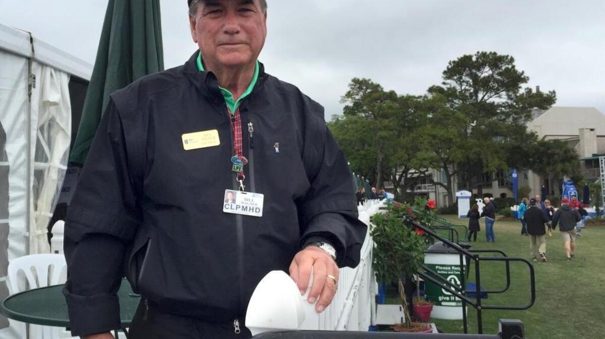 Bill Wagner poses at the hospitality tents by the 18th tee box at Harbour Town Golf Links on Friday, April 15, 2016.
