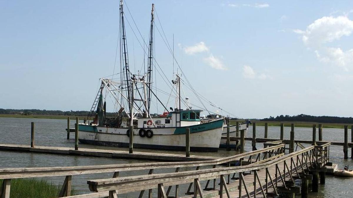 Shrimp boats sit docked at Port Royal’s shrimp docks off 11th Street.