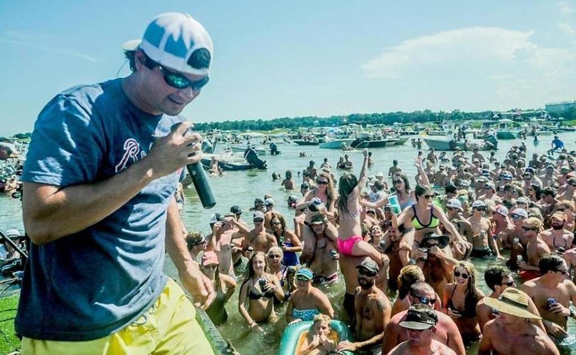 Musician Pat Cooper performs for a crowd during an inaugural Beaufort Water Festival concert at the Beaufort River sandbar last July. The concert is planned again for this year’s festival.