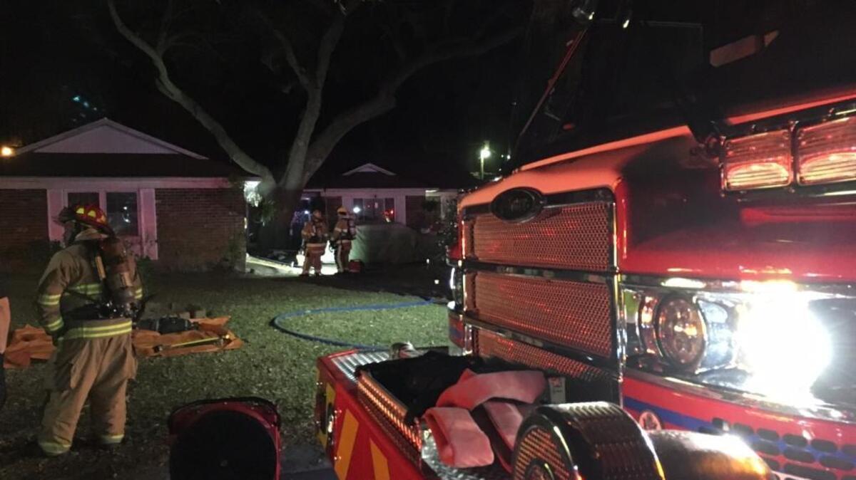 Firefighters extinguished a fire in a Mink Point garage Thursday night.