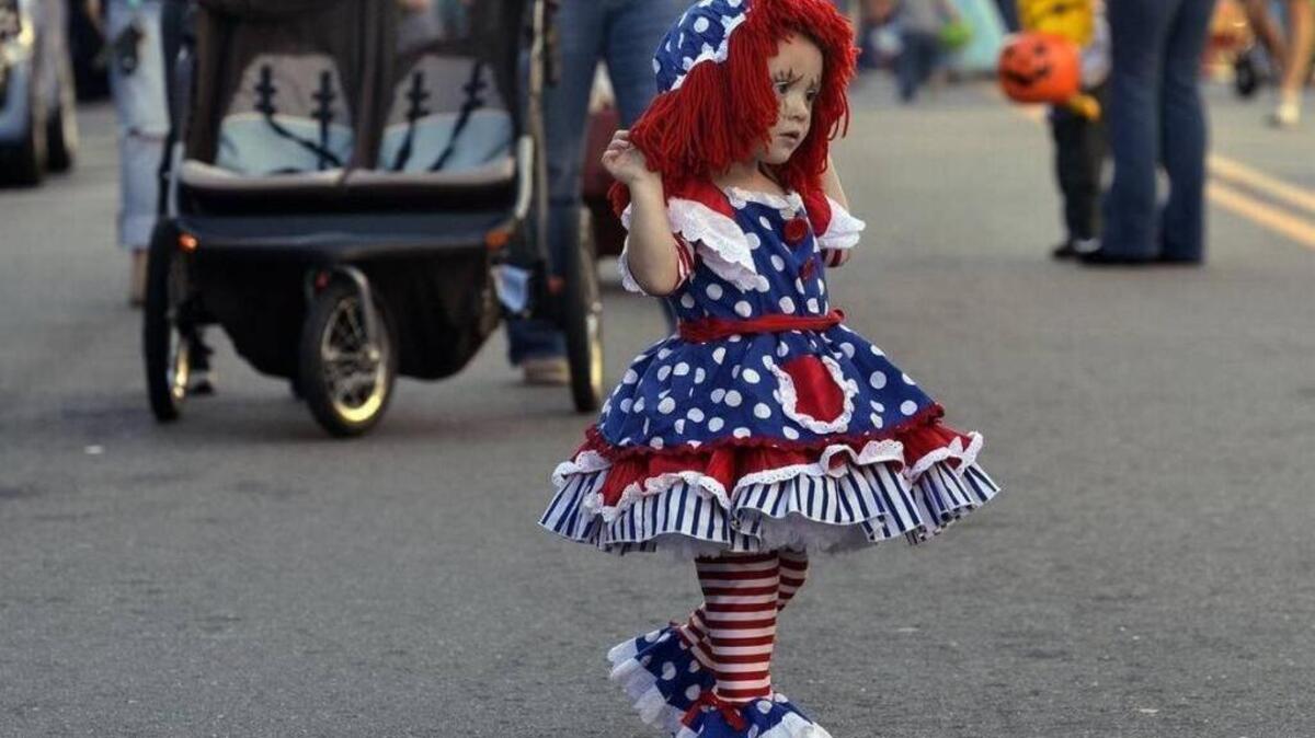 A young girl walks on Bay Street during an annual Halloween trick-or-treat event in Beaufort in this file photo.