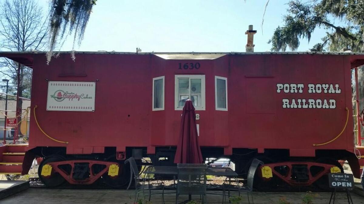 Carolina Cuppitycakes, Port Royal’s new cupcake bakery, is now offically open and located in a train caboose at 1630 Paris Ave.