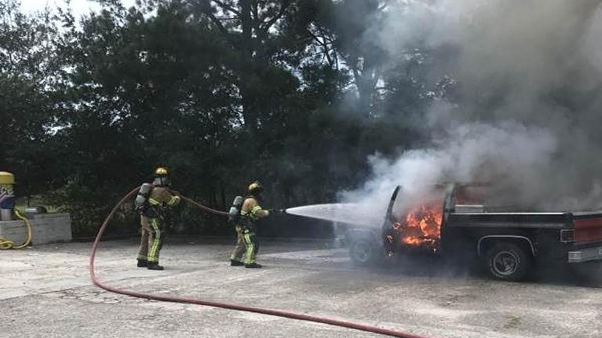 A vehicle fire at a business on U.S. 21 in Burton temporarily shut down two southbound lanes Wednesday afternoon, according to a Burton Fire District news release.