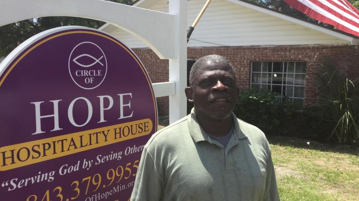 John Dortch, president of Circle of Hope Ministries, stands in front of the Boundary Street building the organization plans to use as a shelter for homeless veterans.