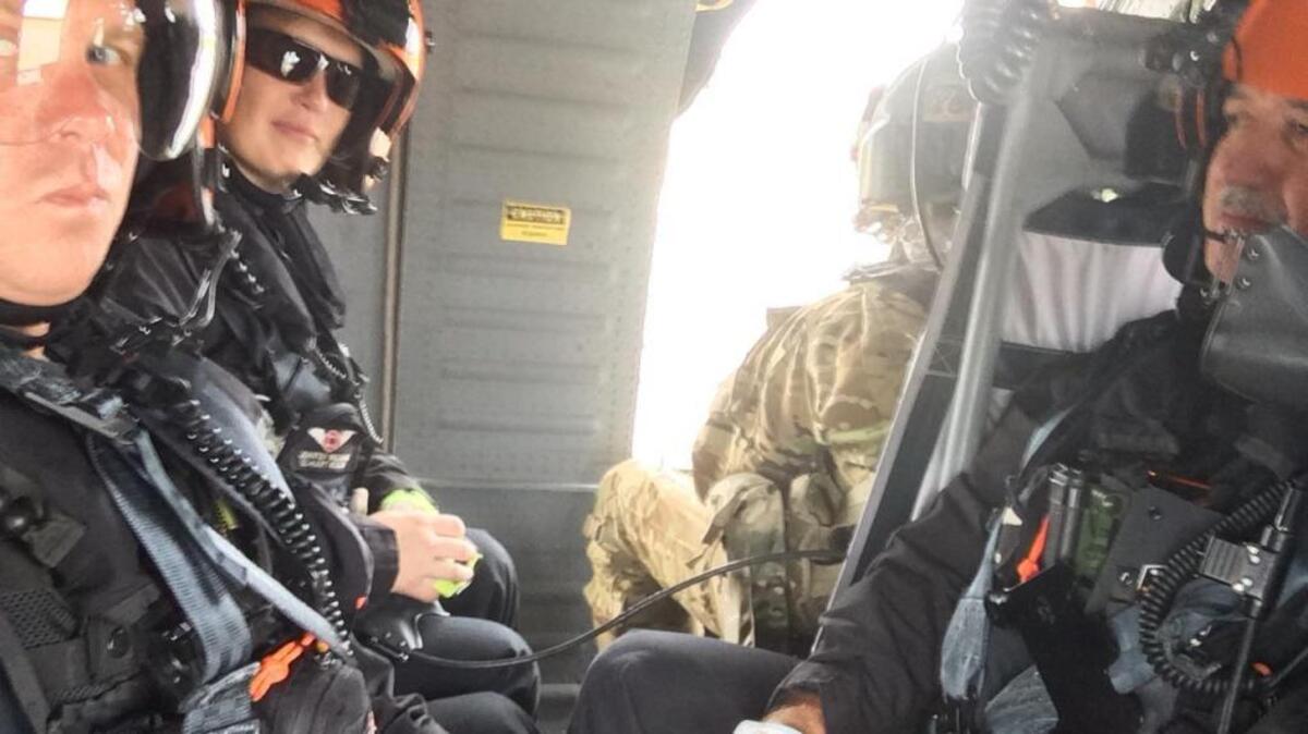 Burton Fire District Deputy Chief Tom Webb (right) and Burton Fire Engineer/EMT Jennifer Williams (left-background) deployed to Texas Monday in support of rescue operations as members of South Carolina HART (Helicopter Aquatics Rescue Team). On the left (forefront) is Bluffton Fire Capt. Emerson Kovalanchik.