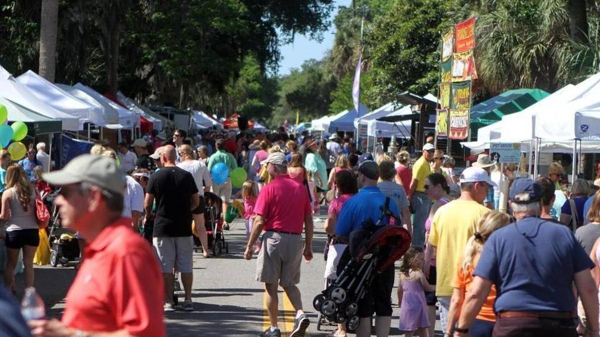 People flock to the Bluffton Village Festival on Calhoun Street in May 2015.