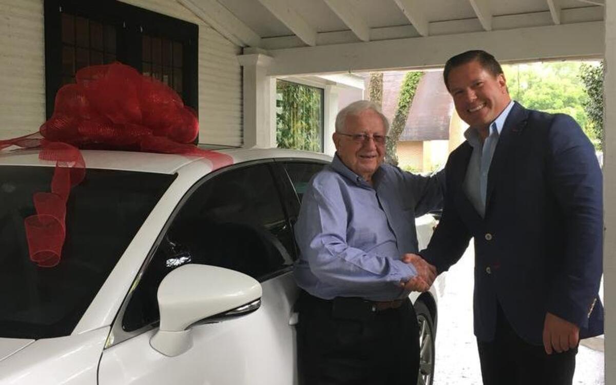 Robert DeLoach, left, has been vice president of Beaufort Engineering Services for 40 years. To honor DeLoach’s service, Walter Bolton, president and CEO of the company for the past 20 years, presented him with a new Lexus GS350.