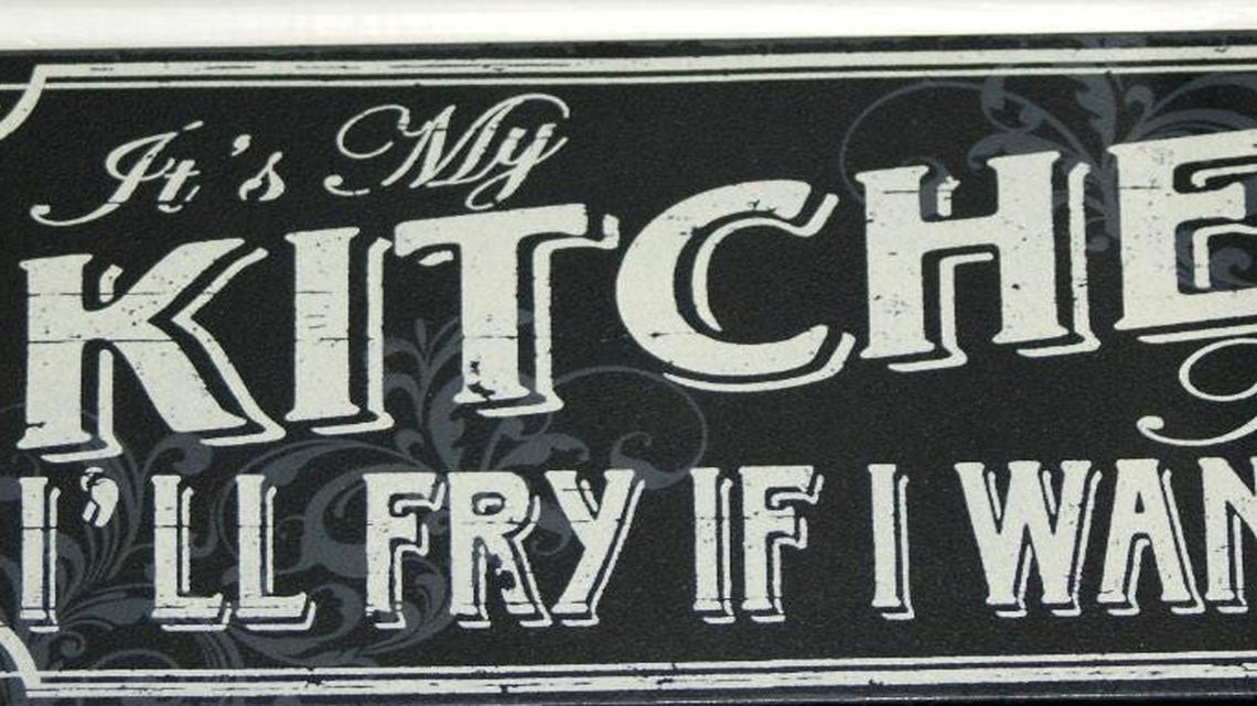 This sign hangs over the doorway in Jean Tanner’s kitchen. It was a gift from grandson Forrest and his wife Jessica because they love her fried chicken.