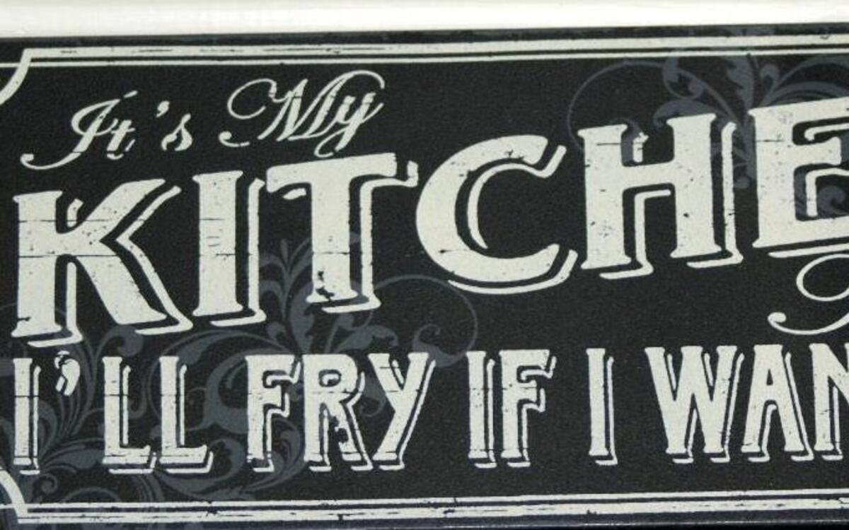 This sign hangs over the doorway in Jean Tanner’s kitchen. It was a gift from grandson Forrest and his wife Jessica because they love her fried chicken.