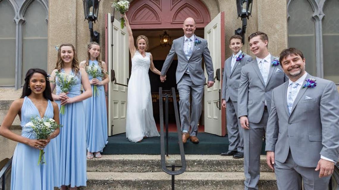 Kieron O’Grady and Annabel Heartsfield emerge as man and wife from a Savannah church.