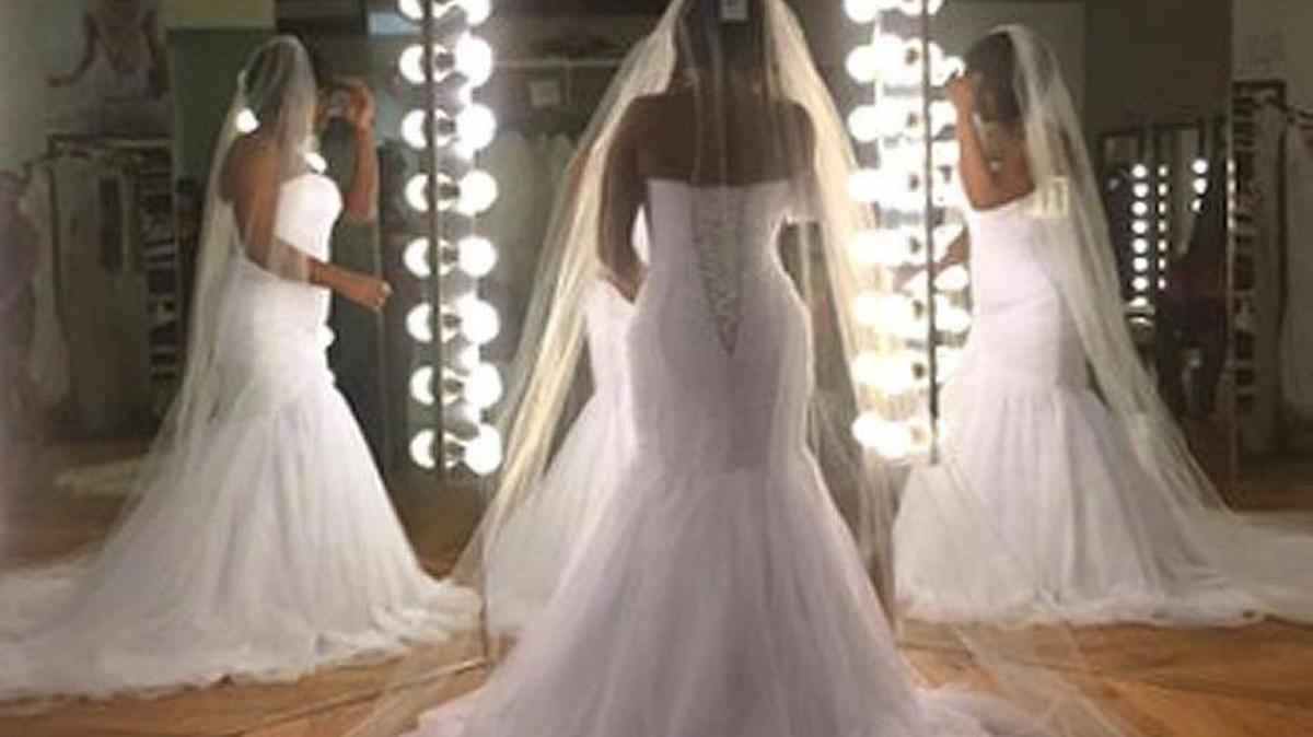 Stacey Evette Bond will wear in her coffin the mermaid-style wedding dress she bought in Atlanta last December.Submitted