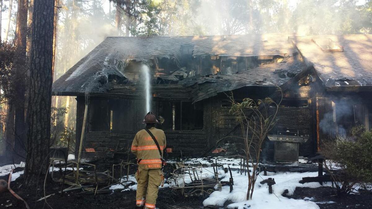 When firefighters arrived, they discovered the fire had spread to the back side of the home.