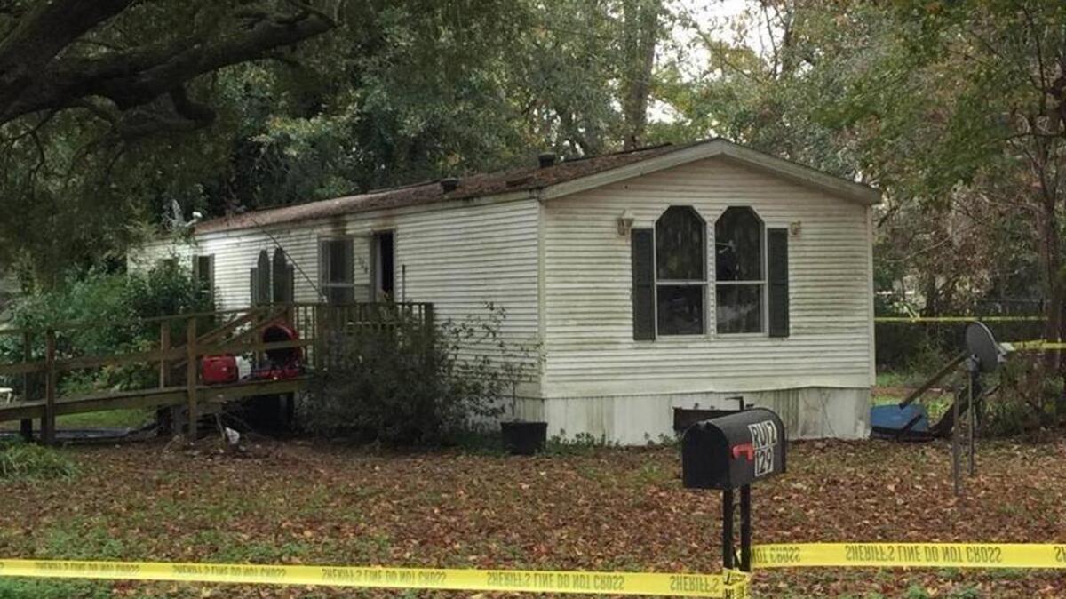 The Falls Road home in Burton that caught fire in December, killing 56-year-old Teresa Seigler a short time later.