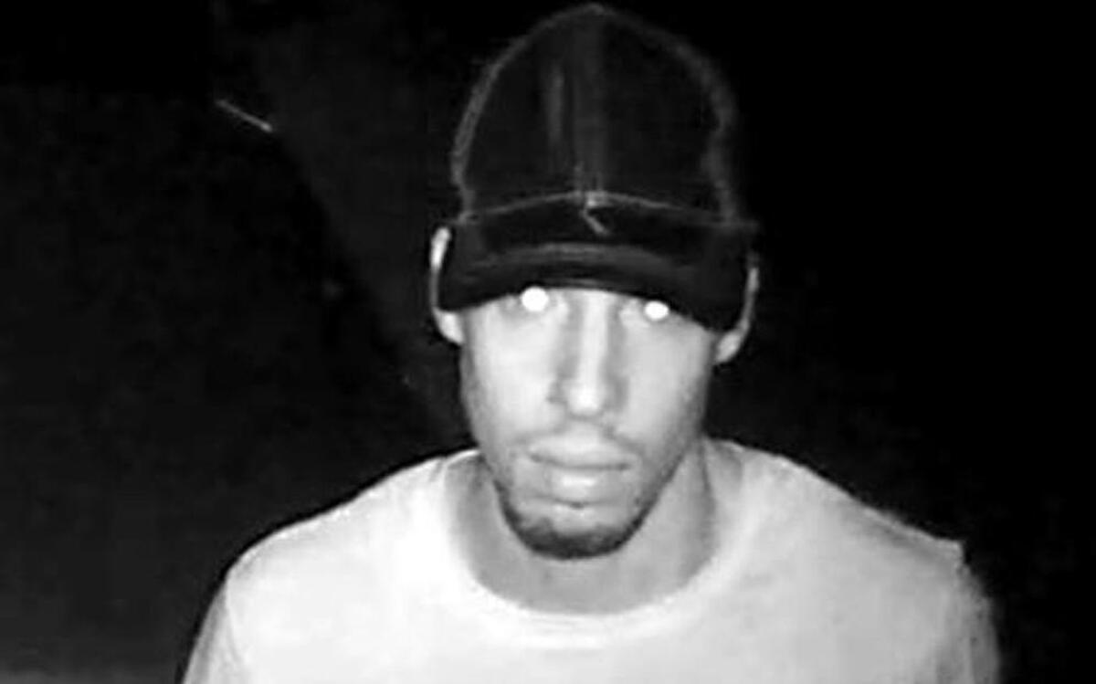 This man was seen on security footage walking up to a Westfield Court home security camera early Wednesday morning. The camera and a vehicle across the street were both reported stolen.