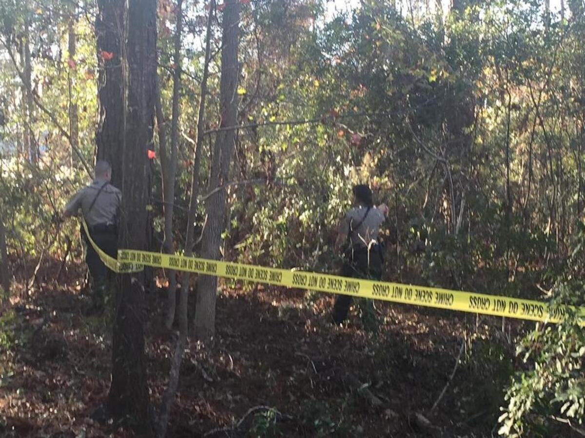 Beaufort County Sheriff’s Office deputies seal off the area where skeletal remains were found on Spanish Wells Road on Christmas Eve in 2016.