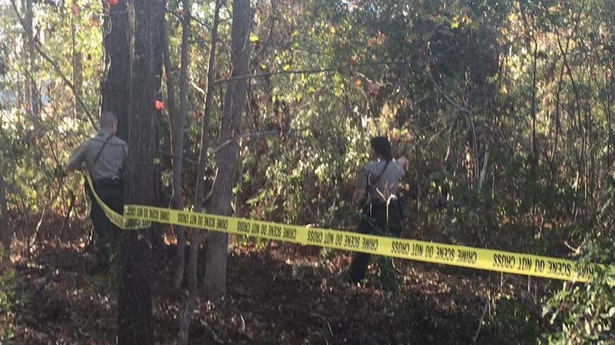 Beaufort County Sheriff’s Office deputies seal off the area where skeletal remains were found on Spanish Wells Road on Christmas Eve.